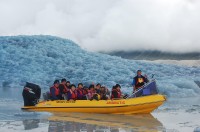 Tourists-get-up-close-and-personal-on-a-Glacier-Explorers-boat-trip